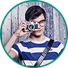 young guy with a camera
